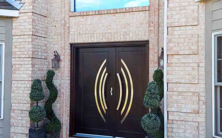 Double door design main door for wide entrance to a luxurious residence