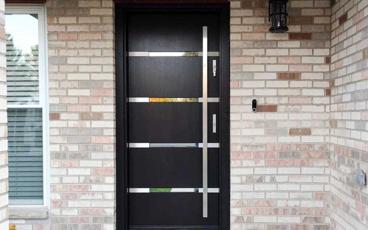 Contemporary Front Door design of a house, an exterior door with safety measures installed and an almost full-length handle