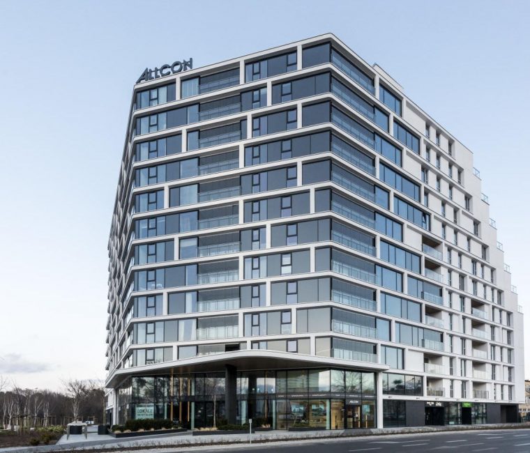 A residential building with combination windows, and stationary glass windows