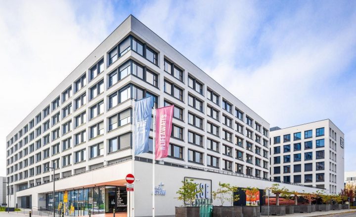 A modern residential building with stationary glass picture windows