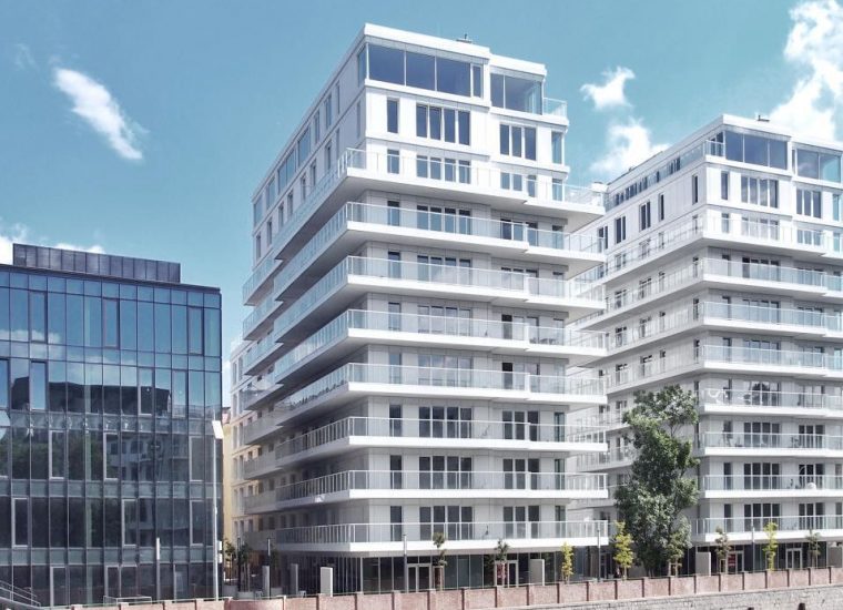 A modern residential place with veranda for every floor, enclosed in metal railings and glass framing